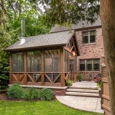 a house with a porch and steps leading up to it