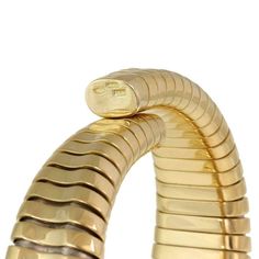 "This is a gorgeous large cuff bracelet, it is crafted from 18k yellow gold featuring a wide front set with sparkling diamonds, all with a total weight of 70 points. The bracelet is in the tubogas design and flex open to allow easy access around the hand. It has the 18k metal content stamp. Material: 18k yellow gold Diamonds: 0.70 total carat weight Color: G-H Clarity: VS1 Measurements: 6.5-7\" x 0.85\" wide x 0.40\" thick Weight: 79.7 grams Stock# 64691" Large Cuff Bracelet, Perfect Figure, Gold Cocktail Ring, Gold Cocktail, Mesh Bracelet, Gold Snake, Vintage Diamond, Sparkle Diamonds, Easy Access