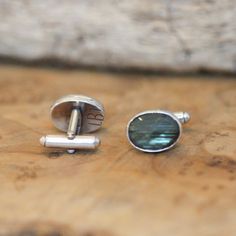 Cufflinks or Cuff Links? Either way, we have opted for .925 Sterling Silver cuff link hardware and a minimal design to highlight these wonderful, diamond faceted, natural Labradorite, 12X16mm stones. These Labradorite Cufflinks - Silversmithed cuff links - offer the wearer not only a super, elegant, and flashy, stone cufflink but also an interesting focal point, as these natural labradorite stones are very unusually flashy and well cut. These labradorite cufflinks will be treasured and chosen fi Business Sterling Silver Jewelry With Polished Finish, Engraved Sterling Silver Jewelry For Business, Sterling Silver Cufflinks With Polished Finish, Modern Sterling Silver Cufflinks With Polished Finish, Minimalist Silver Jewelry For Business, Modern Sterling Silver Cufflinks, Modern Sterling Silver Cufflinks For Business, Silversmith Rings, Jasper Ring