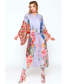 Be unique. Be YOUtiful! The fantasy kimono features a beautiful peacock print in a longline, silky design with slightly sheer floral design sleeve and tie closure at the waist for added shape. Lined & belted peacock floral print kimono with burnout velvet sleeves Blue peacock print Dry clean Self: 100% rayon & contrast: viscose/nylon Fantasy Kimono, Silky Design, Velvet Sleeve, Floral Print Kimono, Blue Peacock, Beautiful Peacock, Burnout Velvet, Peacock Print, Print Kimonos