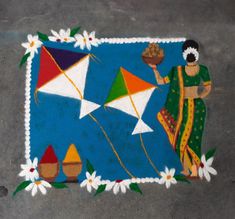 an artistic painting on the ground depicting a woman holding a kite