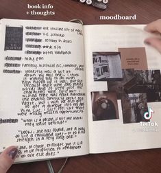 an open book sitting on top of a wooden table