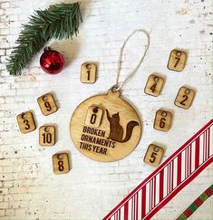 a wooden ornament with numbers and a squirrel on it