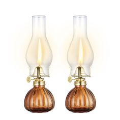 two brown glass lamps sitting next to each other