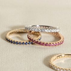 This modern take on an eternity ring features a full circle band of delicate yet sparkly natural emerald gemstones from the Juliette Maison™ collection. Fashioned in 10K rose gold, Wear to add a subtle sparkle to any finger, or style as an accent to your go-to stack of rings. Stackable Everyday Luxury Rings, Rose Gold Half Eternity Stackable Rings, Fine Jewelry Rose Gold Eternity Band With Prong Setting, Rose Gold Stackable Eternity Band, Rose Gold Eternity Band With Halo, Luxury Rose Gold Round Eternity Band, Rose Gold Half Eternity Band Fine Jewelry, Rose Gold Round Eternity Band Fine Jewelry, Rose Gold Round Band Eternity Ring