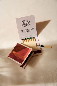 matchboxes with matches on top of each other