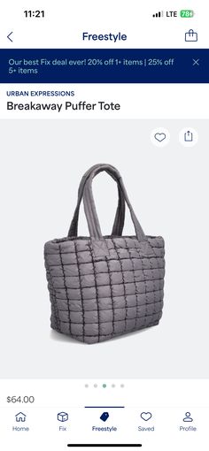 a gray purse is on sale in the store