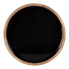 an empty black plate on a white background