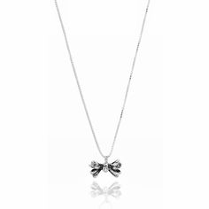 The Bow Necklace is a stunning piece made from high-quality sterling silver, showcasing a beautifully designed bow. This necklace effortlessly blends classic charm with contemporary elegance, making it a versatile accessory for any occasion. Each bow is meticulously handcrafted, ensuring a unique and polished finish that reflects light beautifully. Ideal for those who appreciate artisanal craftsmanship and seek to elevate their jewelry collection with a timeless yet modern accessory. Owning an Unaloe jewel for the pleasure and emoticon of wearing an authentic piece of Italian craftsmanship. Made with the artisanal antiquing technique, which involves blackening 925\\1000% silver, it adds a touch of authenticity to this brilliant necklace. Unique product Unaloe Jewelry pieces are extremely r September Birthstone Jewelry, Modern Accessories, Bow Necklace, Italian Craftsmanship, Italian Jewelry, Silver Bow, Necklace Unique, Pearl Jewellery Earrings, Jewelry Ring Box