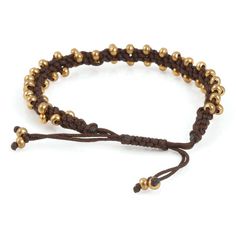 Hand braided bracelet with tiny gold drop beads and slider clasp. Wear this alone, or mix it in with your other everyday favorites for a personalized everyday personal signature piece.length : 6 1/4 - 91/2 inches total width: 1/4 inchtiny 2mm beads : goldthread : chocolate brown cottonfastens with an adjustable cotton cord closureSize: adjustable (fits 5.5 to 8.50 inch wrist)all sizes are approximate Gold Beaded Bracelets With Adjustable Cord, Gold Beaded Bracelet With Adjustable Cord, Everyday Braided Bracelets With Round Beads, Gold Casual Braided Bracelets With Adjustable Length, Adjustable Brown Jewelry For Friendship, Casual Gold Braided Bracelet With Adjustable Length, Adjustable Gold Braided Bracelet With Sliding Knot, Adjustable Braided Brown Jewelry, Casual Gold Braided Bracelet With Adjustable Cord