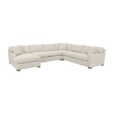 a white sectional couch on a white background