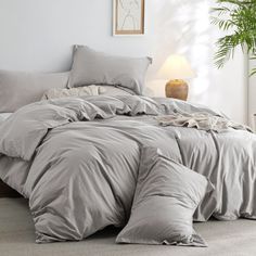 the comforter is made up and ready for someone to use it in their bed