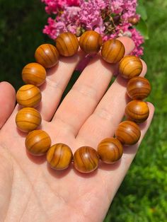 ❤️ This listing is for ONE wooden bead bracelet. Very unique and pretty! ❤️ 15mm stretchy bracelet. ❤️ All orders are packaged with care, sent with love and gratitude🙏 Cheap Wooden Beaded Bracelets For Gifts, Cheap Adjustable Stretch Bracelet With Wooden Beads, Spiritual Wooden Beads Stretch Bracelet For Everyday, Spiritual Stretch Bracelet With Wooden Beads For Everyday, Hand-strung Wooden Bracelets As Gift, Hand-strung Wooden Bracelets For Gifts, Wooden Beaded Bracelets For Gifts, Wooden Bracelets With Round Beads For Gifts, Natural Wood Beaded Bracelets As Gift