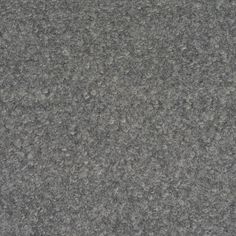 a close up view of a gray granite surface