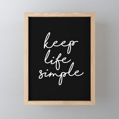 a framed black and white poster with the words keep life single written in cursive font