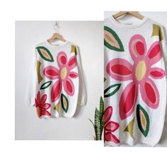 Vintage Knitted Embroidered Floral Sweater Handmade Size: (one size tag) may fit M -L armpit to armpit: 57 cm back length: 71 cm sleeve length from neck to cuff: 73 cm Good condition, very small spot, see photo! visit the shop https://garagevintageclothes.etsy.com Free shipping when you buy 2 items and more 🚚 Trendy Embroidered Knit Sweater, Casual Multicolor Embroidered Sweater For Spring, Oversized Embroidered White Sweater, Oversized Embroidered Sweater For Spring, Retro Cotton Embroidered Sweater, Retro Embroidered Cotton Sweater, White Floral Print Cotton Sweater, Summer Knit Sweater With Floral Print, Sweater Handmade