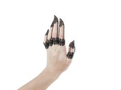 CLAW RINGS "ANTHRACITE" Filigree Claw Rings connected with chains. This unique finger accessory is perfect for cocktails, parties, fashion editorials, music videos, costumes/cosplay, halloween and drag queens. All claws and rings are fully adjustable. - The set of 10 finger armors is always 10% off compared to the set of 5. Hypoallergenic! Myril Jewels designs are Made of Stainless Steel + Anallergic Metal Alloy (lead and nickel safe) Comes in a rigid GIFT BOX with a silver logo + organza bag. G Goth Wedding Jewelry, Finger Claws, Claw Rings, Nail Rings, Metal Glove, Black Claws, Claw Earrings, Halloween Ring, Full Finger Rings