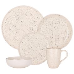 white speckled dinnerware set with two cups and saucers, one bowl and one plate