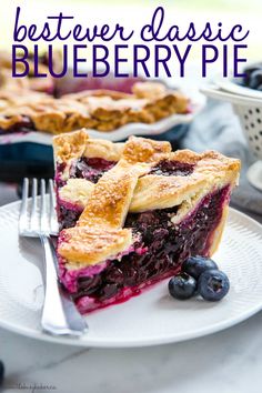 a slice of blueberry pie on a white plate