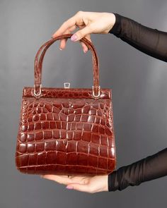 Check out my other items!  WONDERFUL REAL LEATHER HANDBAG For a lady with highest standards of elegance!  THE HANDBAG is in a VERY good CONDITION. Width: 25 cm ( 10 in ) Height: 23 cm ( 9 in ) PLEASE ASK FOR COMBI SHIPPING! GPSR:  Dilart Plus UG Kalthofstr.5 45891 Gelsenkirchen dilart-limited@web.de +491794703055 Elegant Cognac Shoulder Bag, Classic Bags With Hasp Closure, Elegant Cognac Bags For Formal Occasions, Elegant Cognac Formal Bag, Elegant Formal Cognac Bag, Classic Cognac Bag For Formal Occasions, Classic Cognac Evening Bag, Classic Cognac Formal Bag, Vintage Cognac Shoulder Bag For Formal Occasions