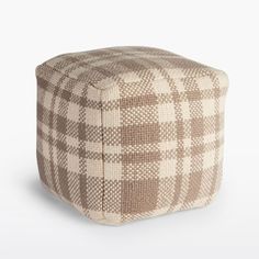 a brown and white checkered poufce on a white background with the word,