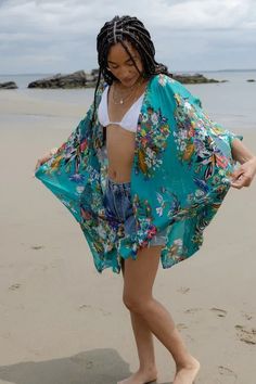 Medium Turquoise Blue Bohemian Rayon Kimono, Green Tropical Kimono For Summer, Green Tropical Summer Kimono, Blue Flowy Kimono For Beachwear, Flowy Blue Kimono For Beachwear, Spring Beachwear Green Kimono, Green V-neck Kimono For Summer, Green Beachwear Kimono For Spring, Blue Free Size Kimono For Spring