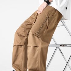 Elevate your style with our Japanese Zipper Pleated Pocket Cargo Pants. With a sleek and unique design, these pants offer both fashion and function. The Japanese zipper adds a touch of luxury, while the pleated pockets provide practicality. Perfect for the fashion-forward individual who appreciates the finer details. Features: -85% Cotton,15% Polyester -Mid-rise waist -Multi-Pockets -Regular Fit -Japanese style Pocket Cargo Pants, Elevate Your Style, Japanese Style, Cargo Pants, Your Style, Fashion Forward, Mid Rise, Unique Design, Unique Designs