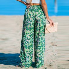 Add a pop of color to your wardrobe with the Green and Pink Abstract Wide Leg Pants, featuring a playful abstract print and comfortable wide-leg silhouette for a chic and vibrant look. Infuse your summer wardrobe with a touch of playfulness and vacation charm by incorporating the Green and Pink Abstract Wide Leg Pants. Product code: CAA02D4C007RP Green High-waisted Printed Bottoms, Green High Waist Printed Bottoms, Spring Abstract Print Wide Leg Bottoms, Casual Wide Leg Pants With Abstract Print, Summer Wide Leg Bottoms With Abstract Print, Beach Pants With Printed Pattern, Wide Leg Bottoms With Abstract Print For Summer, Spring Printed Green Wide Leg Pants, Spring Green Printed Wide Leg Pants