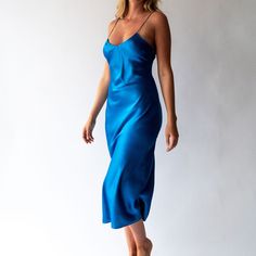 100% Silk. Made in Italy. A timeless silk slip that will last forever, until one day you'll pass it onto your daughter. Blue Silk Slip Dress, Silk Slip Dress, Silk Slip, Blue Silk, Bright Blue, One Day, Going Out, Slip Dress, Midi Dress