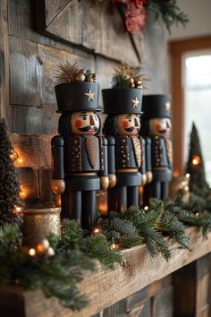 wooden nutcrackers are lined up on a mantel