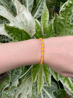 Our beaded bracelets are handmade with care. This sunrise bracelet has an elastic thread meaning it can fit most wrists (15cm-22cm) It is produced with pink, orange, yellow and silver beads and has a lobster claw to ensure it fits to perfection. Our bracelets are packaged carefully with a hand-written thank you note. If you have any questions don't be afraid to ask! Also available in a necklace-find this on our page! Instagram- @beachyxbeautiful Yellow Beaded Bracelets With Round Beads For Everyday, Everyday Yellow Beaded Friendship Bracelets, Adjustable Orange Beaded Bracelets For Everyday, Yellow Round Bead Bracelets For Everyday, Adjustable Yellow Beaded Bracelets With Tiny Beads, Adjustable Orange Bracelets With 8mm Beads, Yellow Bracelets With Tiny Beads For Friendship, Orange Stretch Bracelet With 8mm Beads, Orange Beaded Bracelets For Everyday Wear