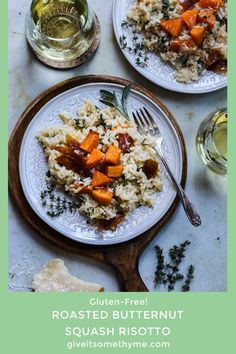 two white plates topped with rice and vegetables