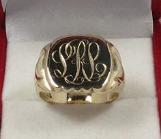 Impressive 10K (stamped) yellow gold men's signet ring. Bears engraved initials "LRL"? SIZE 8.75 (could also be worn as a men's pinkie ring). Weighs 8.13 grams (contains approx. $260.00US in gold). From an estate, ring probably dates to the 1940s or earlier. Classic Yellow Gold Signet Ring With Maker's Mark, Formal 14k Gold Signet Ring With Hallmarks, Collectible Yellow Gold Signet Ring With Initials, Gold Round Signet Ring With Maker's Mark, Gold Signet Ring With Maker's Mark, Formal Engraved Ring With Maker's Mark, Classic Yellow Gold Engraved Ring With Maker's Mark, Classic Engraved Yellow Gold Ring With Maker's Mark, Classic Gold Initial Ring Collectible