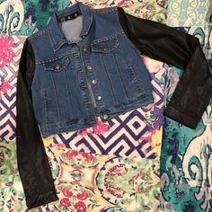 Cute And Fun Cropped Denim Jacket With Fake Leather Sleeves. Jacket Is Embellished On Pockets And Trim. From Forever 21 Premium Denim. Never Worn! Fitted Spring Outerwear With Rivets, Denim Outerwear With Rivets For Fall, Casual Fitted Outerwear With Rivets, Fitted Casual Outerwear With Rivets, Trendy Fitted Outerwear With Rivets, Trendy Denim Jacket For Night Out, Trendy Denim Outerwear For Night Out, Spring Denim Outerwear With Rivets, Denim Fall Outerwear With Rivets