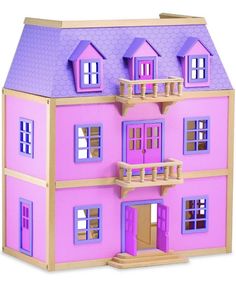 a pink doll house with purple windows and balconies on the second floor is shown