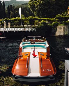 a small boat is docked in the water