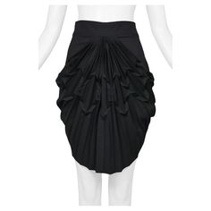 Balenciaga by Ghesquiere Black Asymmetrical Pleated Mini Skirt 2003 | See more vintage Skirts at https://www.1stdibs.com/fashion/clothing/skirts in 1stDibs Evening Pleated Asymmetrical Draped Skirt, Black Asymmetrical Skirt With Folds, Formal Black Ruched Skirt, Evening Pleated Draped Skirt, Pleated Draped Skirt For Evening, Black Mini Skirt With Accordion Pleats, Black Asymmetrical Pleated Skirt For Evening, Evening Pleated Asymmetrical Skirt, Evening Asymmetrical Pleated Skirt