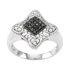 Add a touch of allure to your accessories collection with this black and white diamond ring. Add a touch of allure to your accessories collection with this black and white diamond ring. Packaging: boxed Sterling Silver base Polished finish Plating: 10k white gold, rhodium 17 mm DIAMOND DETAILS Total carat weight: 1/5 ct. Clarity: I1-I2 Color grade: H-I Prong Color: Multicolor. Gender: female. Age Group: adult. Classic Diamond Ring With Black Diamonds, Black Diamond Ring With Diamond Accents For Wedding, Black Diamond Wedding Ring With Diamond Accents, Black Diamond Wedding Ring With Accents, Black Diamond Rings For Evening, Elegant Silver Diamond Ring With Black Diamonds, Elegant Rings With Black Diamonds In Diamond White, Diamond White Ring With Black Diamonds, Elegant Diamond White Rings With Black Diamonds