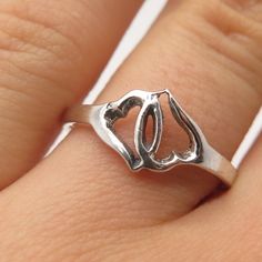 Great vintage condition.  925 Sterling Silver Vintage Open Hearts Ring Size 8  Weight: 1.7g   WELCOME TO PAWN SHOP We are an actual pawn shop and have been in business for over 25 years. Since 1990, our establishment has been serving a variety of clients by providing them with short term cash solutions and options of liquidity regarding their treasured heirlooms. Acknowledging that today′s customers are very sophisticated and are looking for a variety of investments, our acquisitions are hand-pi Classic Sterling Silver Heart Ring For Valentine's Day, Classic Silver Open Heart Rings, Classic Heart-shaped 925 Stamped Rings, Classic Heart Shaped 925 Stamped Rings, Vintage Heart Ring Stamped 925, Vintage 925 Stamped Heart Ring, 925 Silver Open Heart Wedding Ring, Classic Silver Heart Promise Ring, Classic Sterling Silver Heart Ring For Anniversary