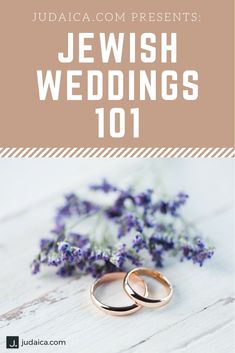 two wedding rings sitting on top of a table next to lavender flowers and the words judaism com presents jewish weddings 101