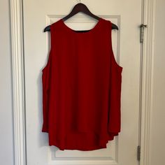 Vince Camuto Women’s Cut Out Shoulder High Low Red Blouse Size Xl Never Worn Very Flattering And Flowy Questions? Comment Below! Red Sleeveless Blouse For Work, Pink Bodycon Dresses, Red Blouse, Tie Front Blouse, Purple Sweater, Pink Floral Dress, Flowy Tops, Red Blouses, Black Sleeveless