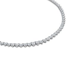 This Heart Shape Diamond Tennis Necklace is a gorgeous version of a classic tennis necklace. Designed with fine quality heart shape diamonds. Available in 18K White Gold, Yellow Gold and Rose Gold Diamond weight = 26.69 carats (0.32ct each) Diamond quality = D-F/VVS Necklace length = 16in Luxury Heart Necklace With Brilliant Cut For Formal Occasions, Luxury Heart-shaped Necklace With Prong Setting, Luxury Brilliant Cut Heart Necklace For Formal Occasions, Elegant Heart Cut Tennis Necklace, Elegant Heart-shaped Tennis Necklace, Elegant Heart-shaped Tennis Necklace For Gift, Diamond Tennis Necklace, Soft Toothbrush, Heart Shaped Diamond