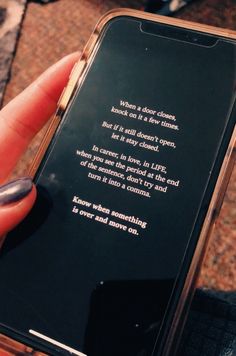 a person holding an iphone with a poem on it