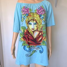 Wear As A Tshirt Or Dress This Insane Blue Nwt Deadstock Ed Hardy Shirt Is The Stuff Of 90s And Y2k Styles Dreams A Size 2x With Graphic Print, Shoulder Cut Outs And Diamants. Size 2x Pit To Pit: 40” Length: 29” Priced For Quick Sale, Don’t Sleep On This Beauty, See Closet To Bundle Blue Casual T-shirt Dress For Spring, Casual Blue T-shirt Dress For Spring, Casual Blue Dress With Graphic Print, Blue Cotton Dress With Graphic Print, Blue Graphic Print Short Sleeve Dress, Blue Graphic Print Dress With Short Sleeves, Blue Short Sleeve Dress With Graphic Print, Blue Short Sleeve Cotton T-shirt Dress, Casual Blue Short Sleeve T-shirt Dress