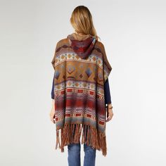 Stand out from the crowd in our Juana Aztek Printed Hooded Cardigan. This unique piece is designed with an open front for easy wear, a cozy hood for extra warmth, and trendy fringe details for a touch of boho chic. The side slits add a bit of edge, making it a versatile option for any fashionista. Materials: Acrylic/Viscose/Nylon. One-size Bohemian Outerwear For Cold Weather, Bohemian One-size Outerwear For Cold Weather, One Size Bohemian Outerwear For Cold Weather, Bohemian Hooded Cardigan For Fall, One Size Winter Outerwear With Fringe, Bohemian Hooded Poncho For Fall, Bohemian One Size Outerwear For Outdoors, Trendy Fringe, Ombre Sweater