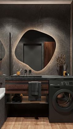 a washer and dryer in a bathroom with wood flooring on the walls