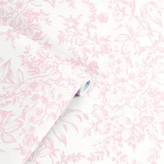 pink and white wallpaper with flowers on it