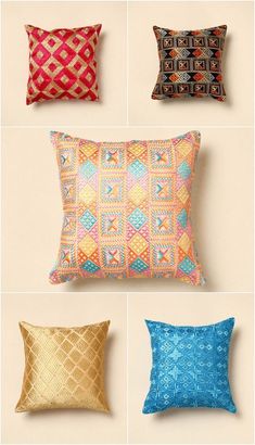 four different types of decorative pillows in various colors and patterns, all on one pillow