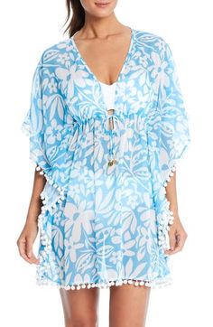 Feel fun and free as you stroll the beach in this cover-up caftan that's sheer, breathable and anchored by darling pompom trim. 34" length (size medium) Slips on over head Deep V-neck with ties Elbow-length sleeves Semisheer 100% polyester Hand wash, line dry Imported Vacation V-neck Kaftan With Tassel Ties, Beachwear V-neck Cover-up With Tassels, Blue Tassel Cover-up For Summer, Spring Kaftan With Tassel Ties, Spring Beach Dress With Tassel Ties, Summer Blue Swimwear With Tassels, Blue Tasseled Swimwear For The Beach, Blue Tasseled Swimwear For Beach, Spring V-neck Kaftan For Pool