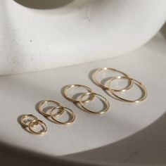 These sweet and delicate hoops are your newest addition to your earring collection! Simple and effortless, our Goldie Hoops are a favorite for everyday style. You can leave these in and always feel dressed for the right occasion - you can even buy charms from our Charm Bar to create a customized look! DETAILS Available in 14k Gold Fill or Sterling Silver 10mm, 14mm, 16mm or 24mm diameterChoose between a single earring or a pair. Hypoallergenic and water-proof Stackable 14k Gold Hoop Earrings As Gift, 14k Gold Stackable Hoop Earrings As Gift, Classic Small Hoop Stackable Earrings, Classic Stackable Hoop Earrings For Everyday, Classic Everyday Stackable Hoop Earrings, Classic Stackable Earrings As Gift, Classic Stackable Earrings For Gifts, Everyday Small Stackable Hoop Earrings, Elegant Stackable Hoop Earrings For Everyday